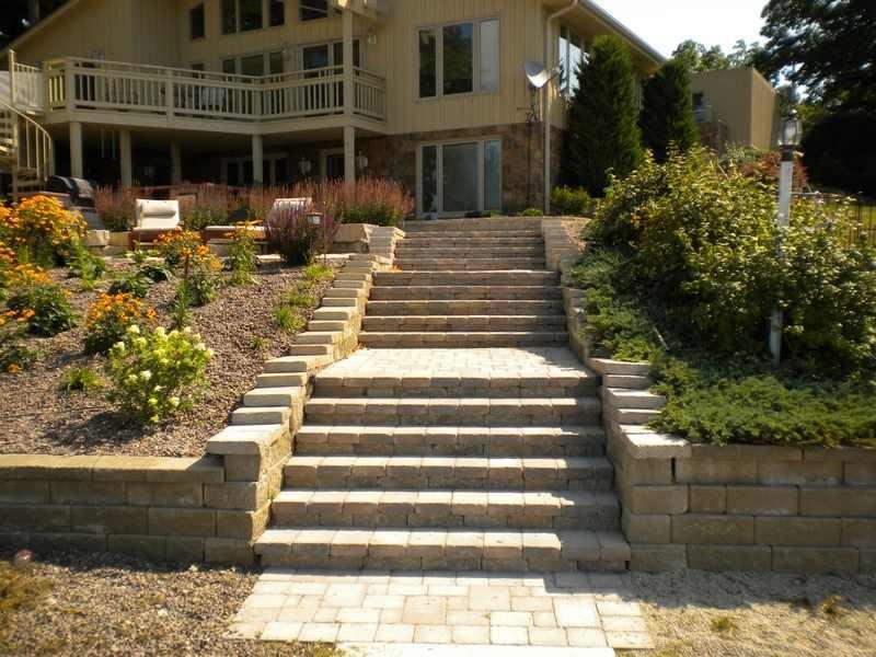 Stone steps lead up to Lake Geneva house